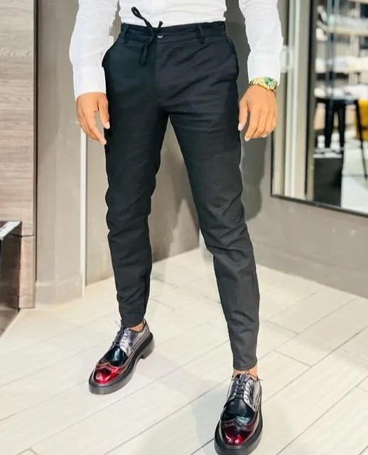 Certainly! Heres an optimized title for the e-commerce product:

Stylish Black Pants for Men - Classic Fit, Versatile and Comfortable