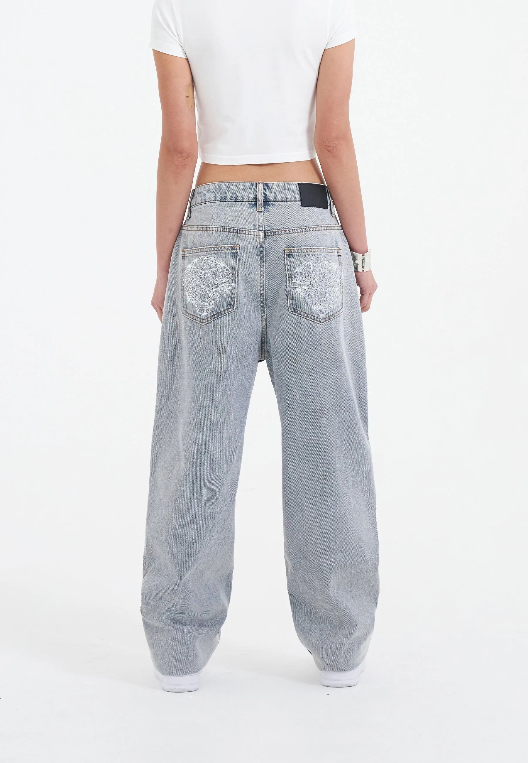 Bleached Denim Trousers for Women with Crystal Roar Diamante Accents in a Relaxed Fit Style