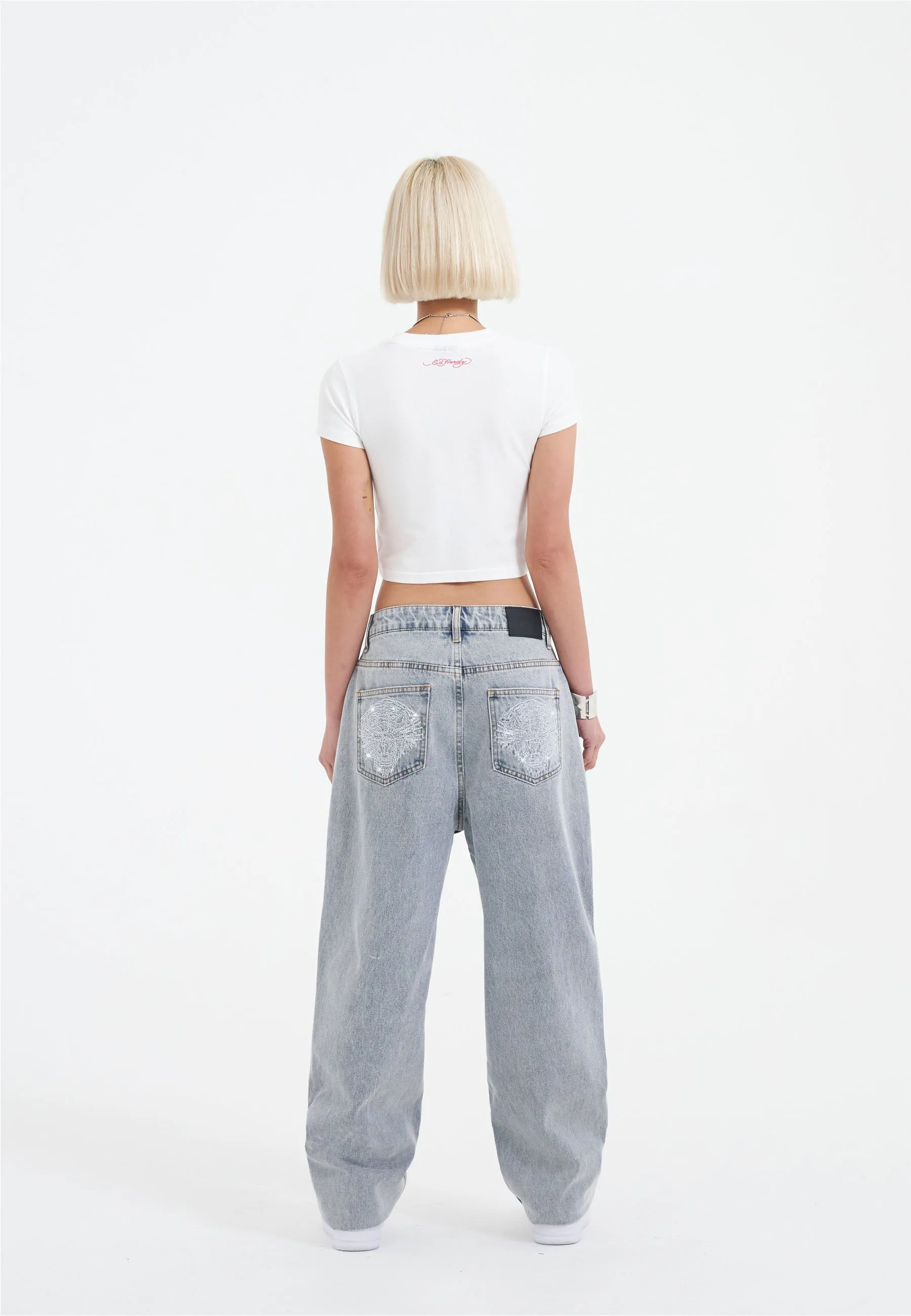 Bleached Denim Trousers for Women with Crystal Roar Diamante Accents in a Relaxed Fit Style